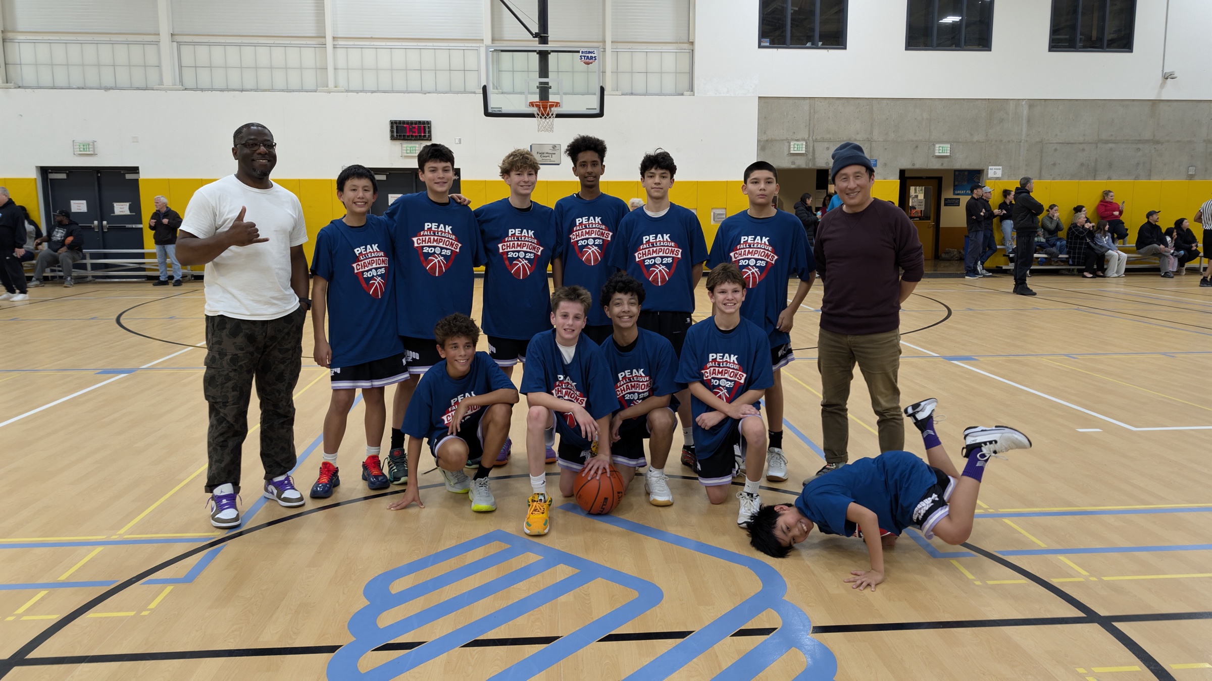 Neighborhood Kidz players celebrating their 2025 PEAK Fall League Silver Division championship