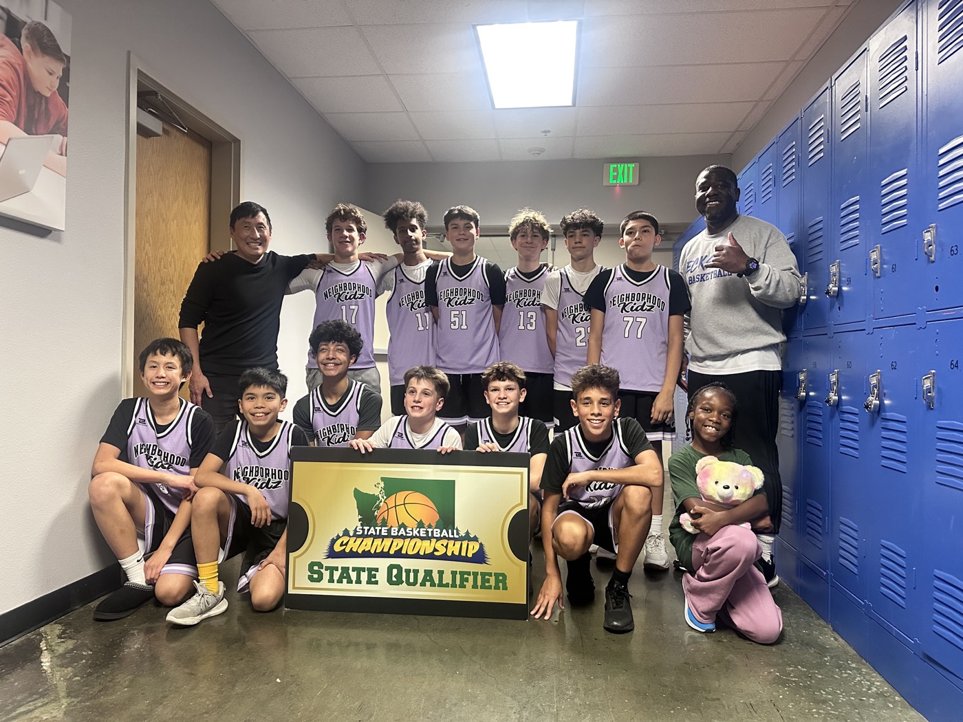 Hoops4Him Fall Classic championship team by blue lockers